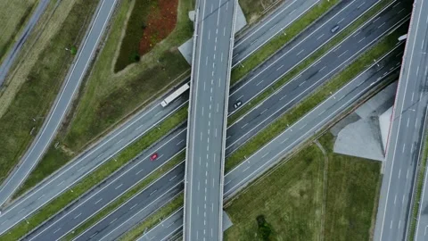 Video filming from a drone, view of the road junction with cars moving along it Stock Footage 171006621