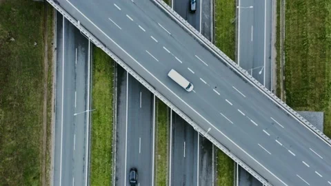 Video filming from a drone, view of the road junction with cars moving along it Stock Footage 171007800