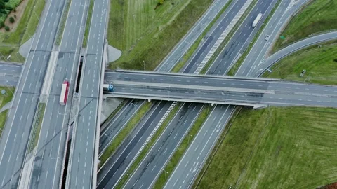 Video filming from a drone, view of the road junction with cars moving along it Stock Footage 171010482