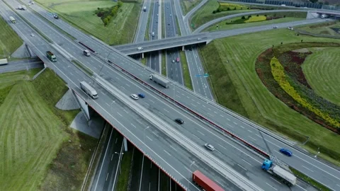 Video filming from a drone, view of the road junction with cars moving along it Stock Footage 171013555