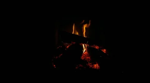 Video of fire in the fireplace in the evening Stock Footage 220556466