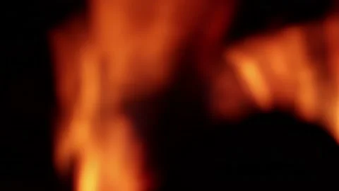 Video of fire in out of focus (bokeh) detail. Stock Footage 238965140