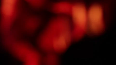 Video of fire in out of focus (bokeh) detail. Stock Footage 238965152