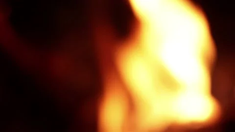 Video of fire in out of focus (bokeh) detail. Видео 238965190