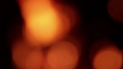 Video of fire in out of focus (bokeh) detail. Stock Footage 238965237