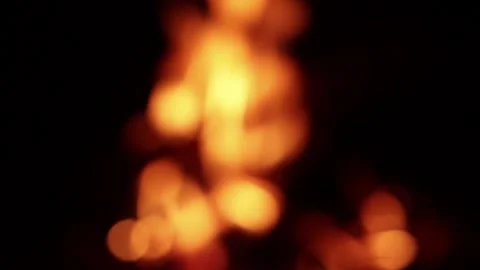 Video of fire in out of focus (bokeh) detail. Stock Footage 238965238