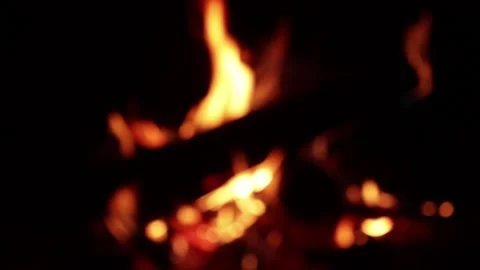 Video of fire in out of focus (bokeh) detail. Видео 238965240