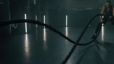 Video of fit man training with rope at gym. active, fit, sporty and healthy Stock Footage 204847733