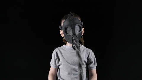 Video of five-year-old boy in gas mask Video stock 156546359