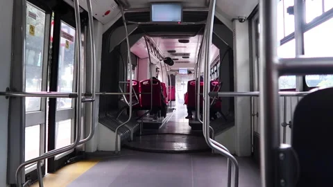Video, fixed closed shot of the interior of a Mexico City metrobus in motion Stock Footage 183734192