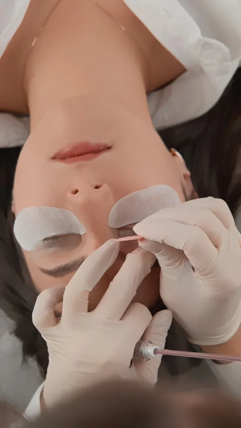 This video focuses on techniques for using a lash lift. From preparation to the Stock Footage 276312411