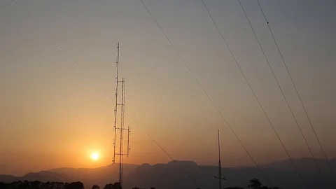 Video footage of a cell tower in the sunset Stock Footage 78557669