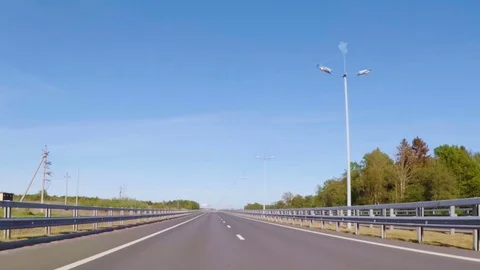 Video footage. Point of view back vehicle drive car travel highway blue sky d Stock Footage 80796652