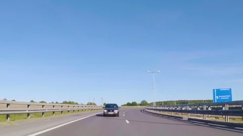 Video footage. Point of view back vehicle drive car travel highway blue sky d Stock Footage