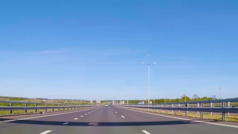 Video footage. Point of view back vehicle drive car travel highway blue sky d Stock Footage
