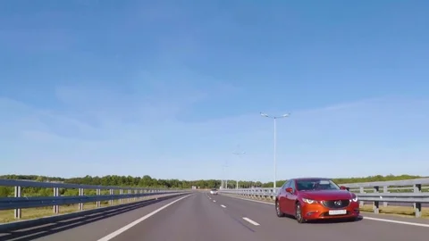 Video footage. Point of view back vehicle drive car travel highway blue sky d Stock Footage