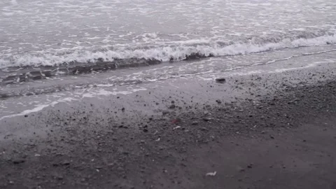 Video footage of waves on a beach Stock Footage 165975754