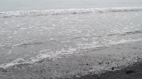 Video footage of waves on a beach Stock Footage 165975929
