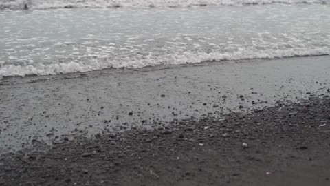 Video footage of waves on a beach Stock Footage 165976120