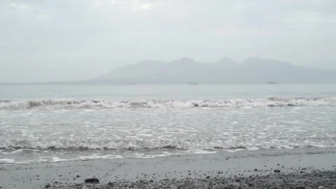 Video footage of waves on a beach Stock Footage 165976140