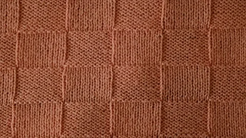Video of fragment of knitted sweater with pattern. Stock-Footage 257069552