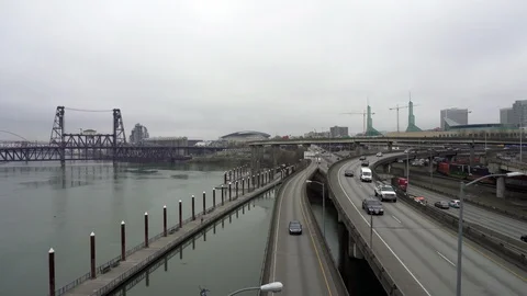 Video of freeway traffic and cargo train in downtown Portland OR one winter day Stock Footage 87568373