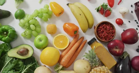 Video of fresh fruit and vegetables on white background Stock Footage 335807561