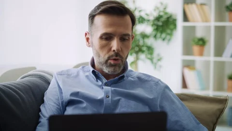 Video of frustrated man gesturing during a video conference. Stock Footage 128811193