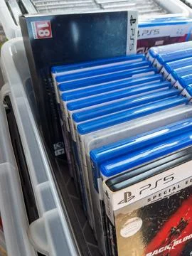Video Game Collection in Plastic Storage Container Stock Photos