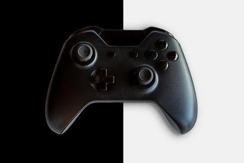 Video game controller and game controller. Black and white background. Select Foto stock