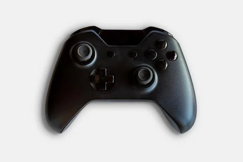 Video game controller and game controller. White background. Selective focus Foto stock