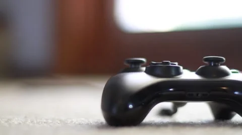Video Game Controller Lying on Floor 2 Stock Footage 49122013