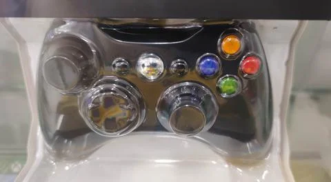 Video game controller sealed and sold in department store Stock Photos
