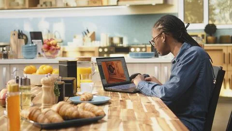 Video game developer testing lobby experience and programming mechanics Stock Photos
