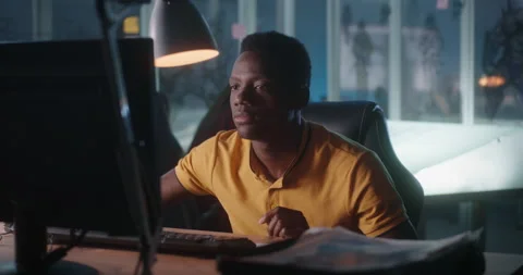 Video game developer at work Stock Footage 133997496