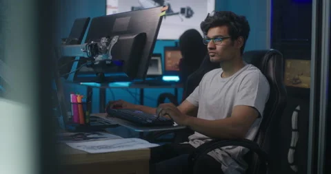 Video game developer at work Stock Footage 134001383