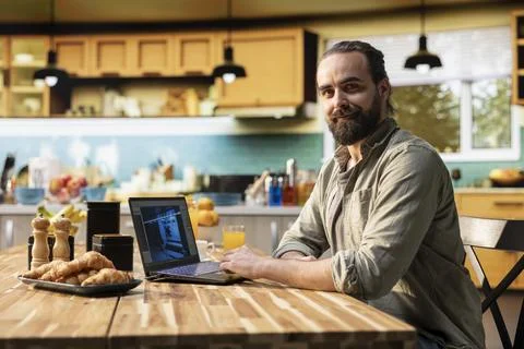 Video game developer working from home to design playable gaming experience 写真素材