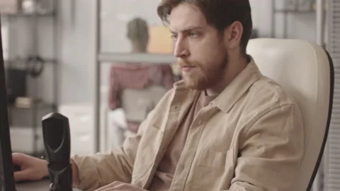 Video Game Developer Working in Office Video stock 172192157