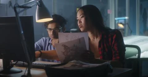 Video game developers discussing graphic design Foto stock