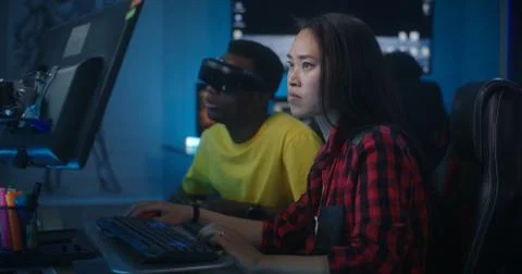 Video game developers working together Stock Photos