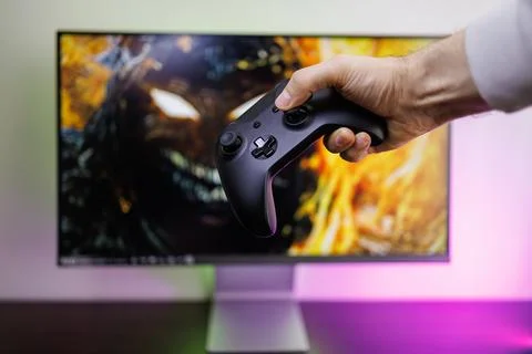 Video game gamepad in hand Stock-Fotos