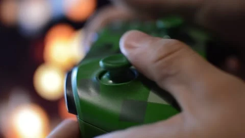 Video game player in a blurred background 動画素材 201840797