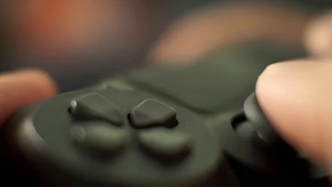 Video game playing focus on the controllers thumbstick close up shot4 Stock Footage 115932309