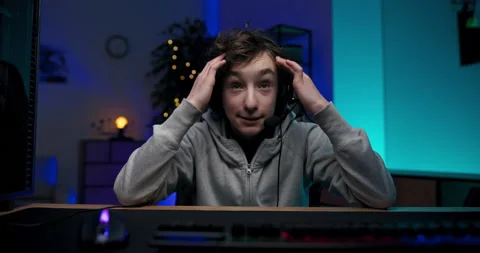 A video gamer playing on the computer lost a round in the online championship Stock Footage 177088432