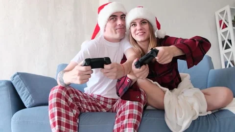 Video games and competitions concept. Expressive man and woman play video games Vídeo Stock 142935855