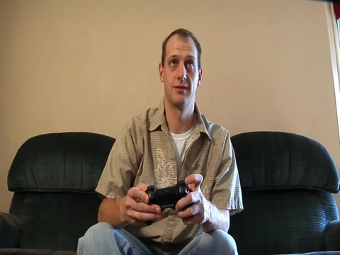 Video gaming black controller Stock Footage 37013867