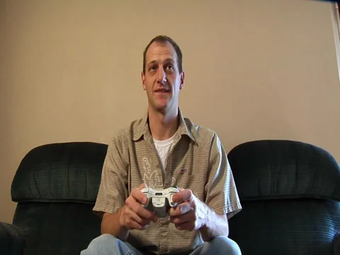 Video gaming white controller Видео 37013893