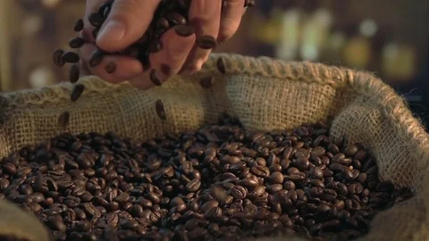 Video of grabbing coffee beans in real slow motion Stock Footage 79589511
