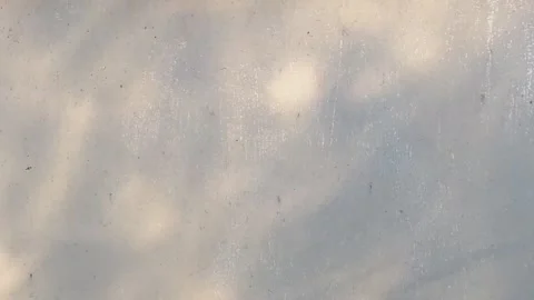 Video of gray concrete surface with beige shadows and light spots Stock Footage 337143653