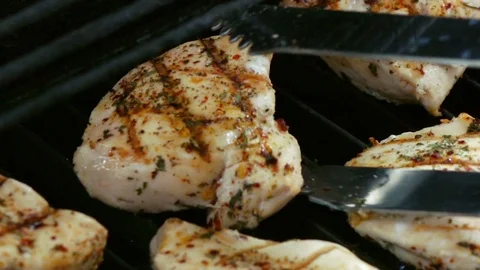 Video of grilling poultry in real slow motion Stock Footage 80708171